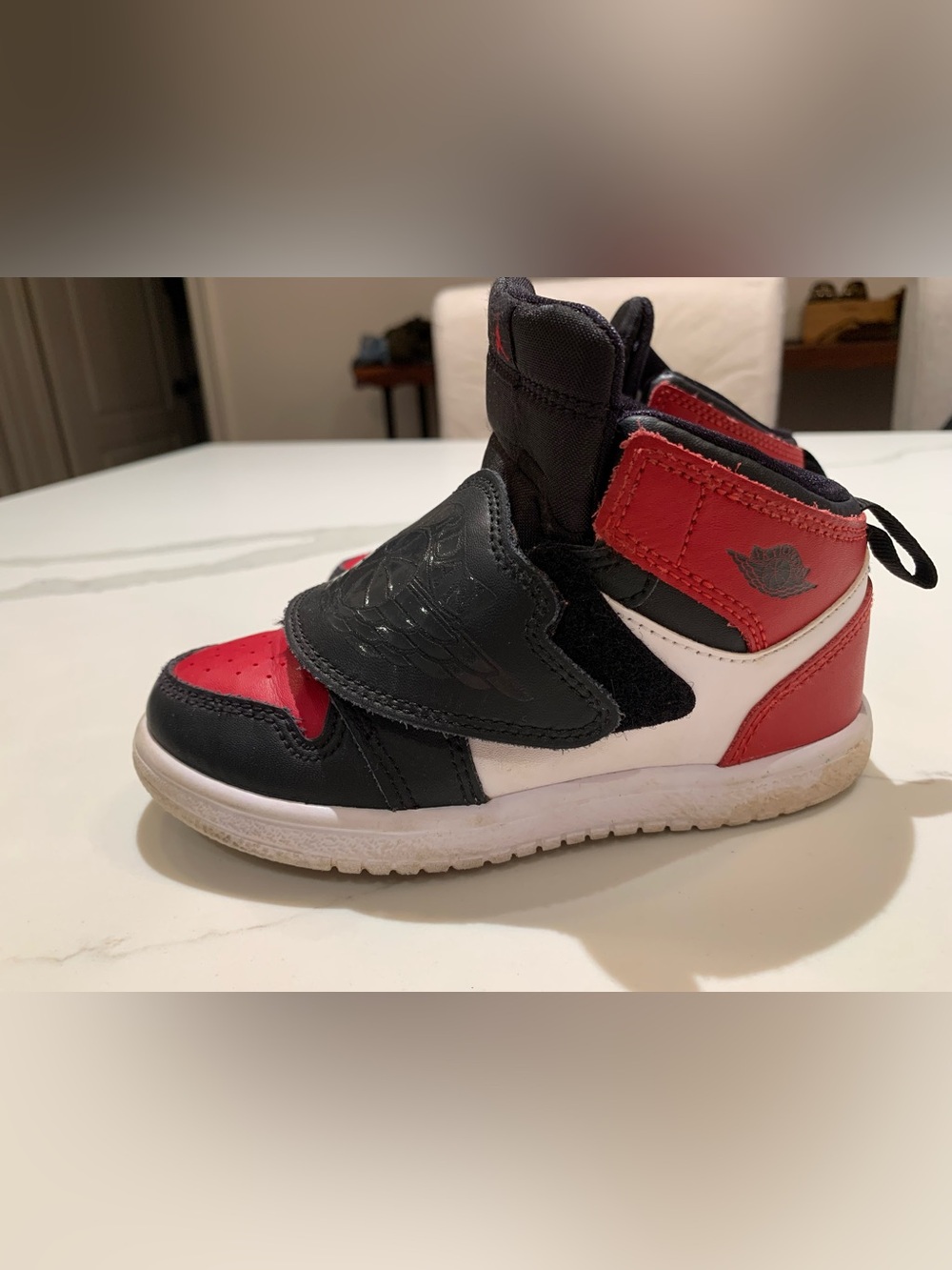 Jordan Kids High-Top Sneaker in Black, Red & White